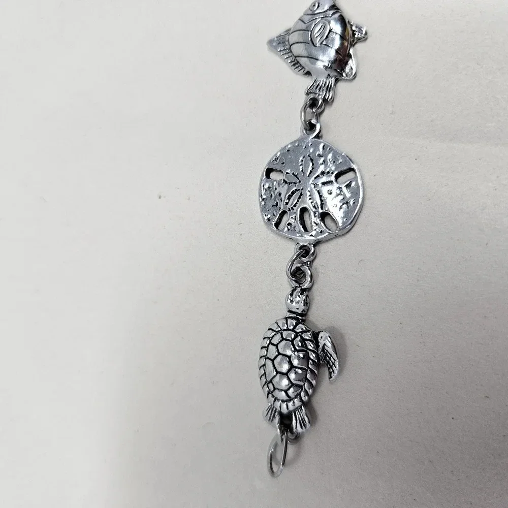 Sea life wrist bracelet Silver Tone Sea Turtle Sand Dollar Fish 7 In. Dolphin